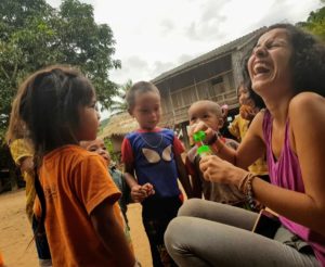 Playing with kids of Khamu minority, Laos