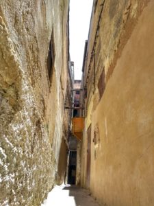 Typical narrow street in Medina of Fez